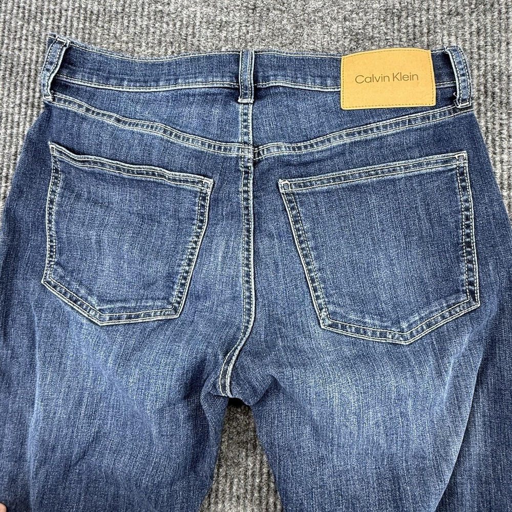 Calvin Klein Men's Slim Straight Blue Denim Jeans, Cotton, Medium Wash, 5-Pocket - Picture 6 of 6